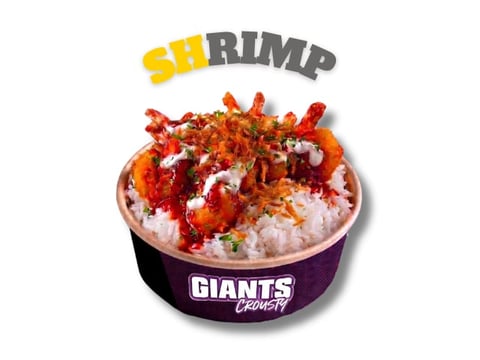 Bowl of shrimp and rice with crispy tempura shrimp on top in purple Giants branded bowl